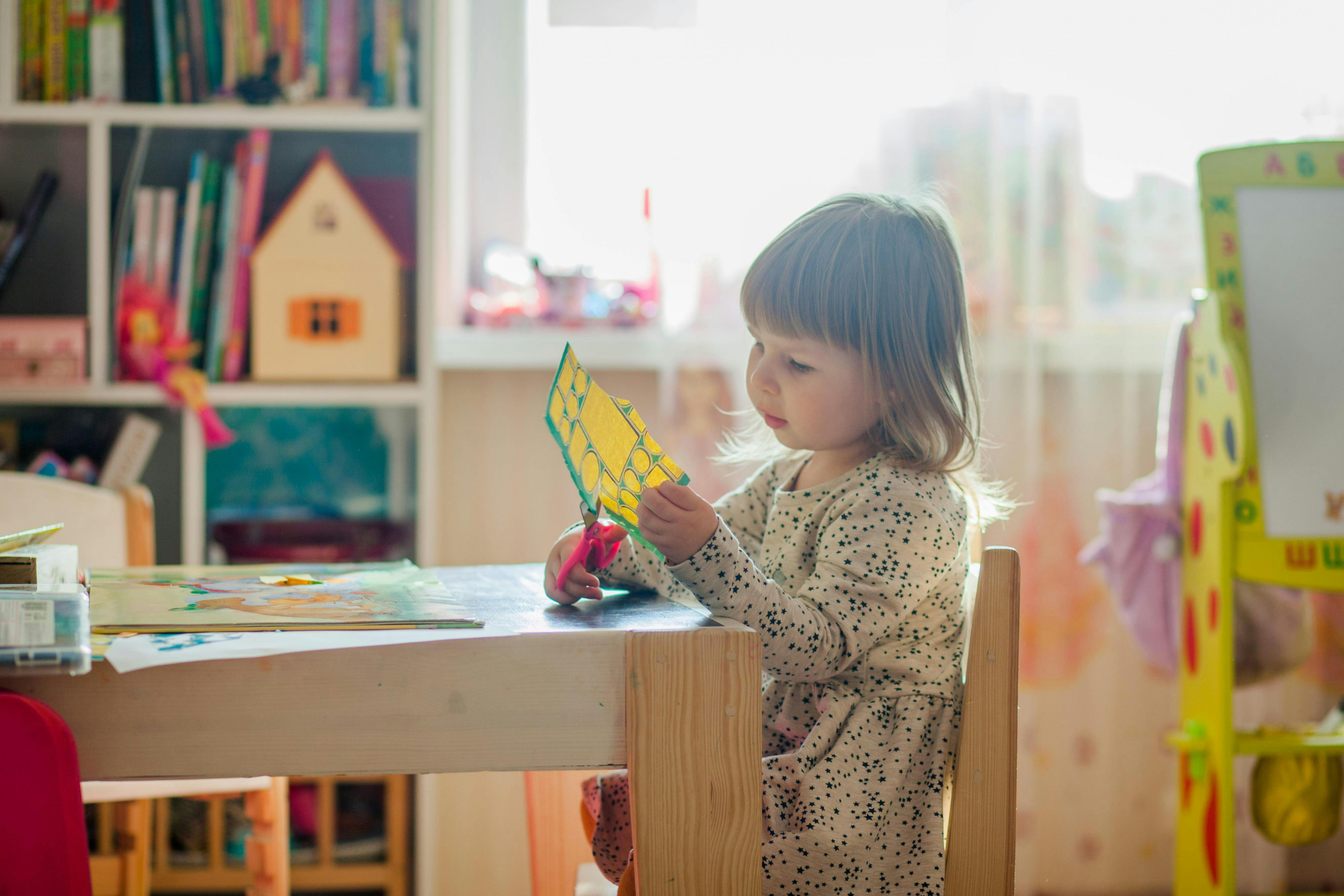Young student building fine motor skills